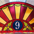 Completed restoration of address transom window